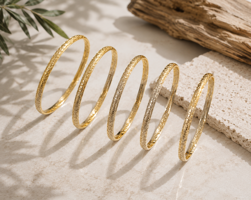 Hawaiian style gold bangle set