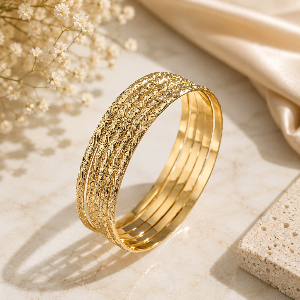 Hawaiian style gold bangle set