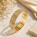 Hawaiian style gold bangle set